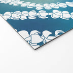 Puakenikeni single lei art on blue Welcome Mat Gallery Image 2