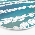Puakenikeni single lei art on blue Bath Mat Gallery Image 3