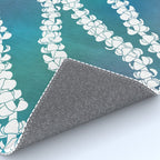 Puakenikeni single lei art on blue Rug Gallery Image 4