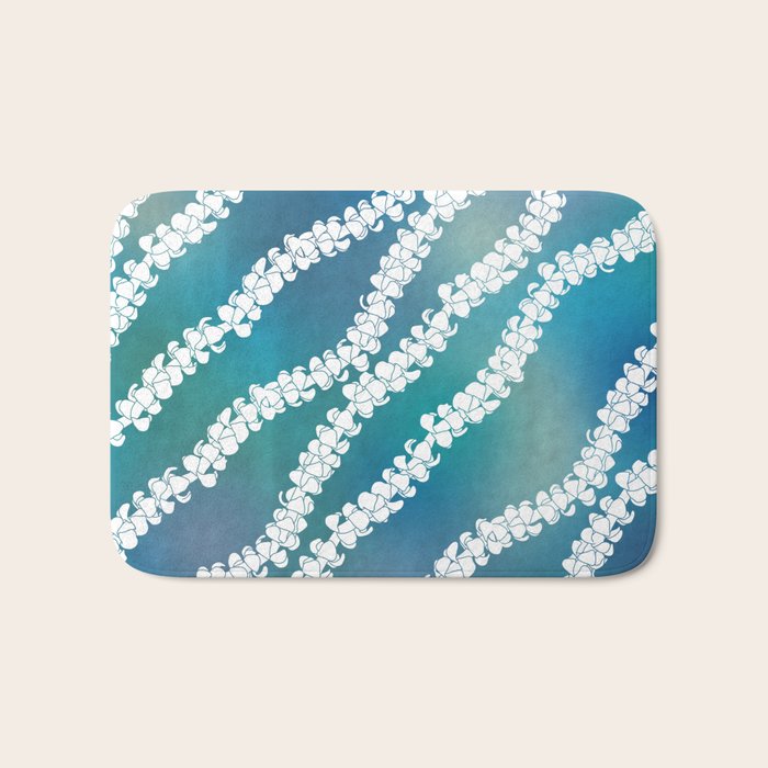 Puakenikeni single lei art on blue Bath Mat Gallery Image 1
