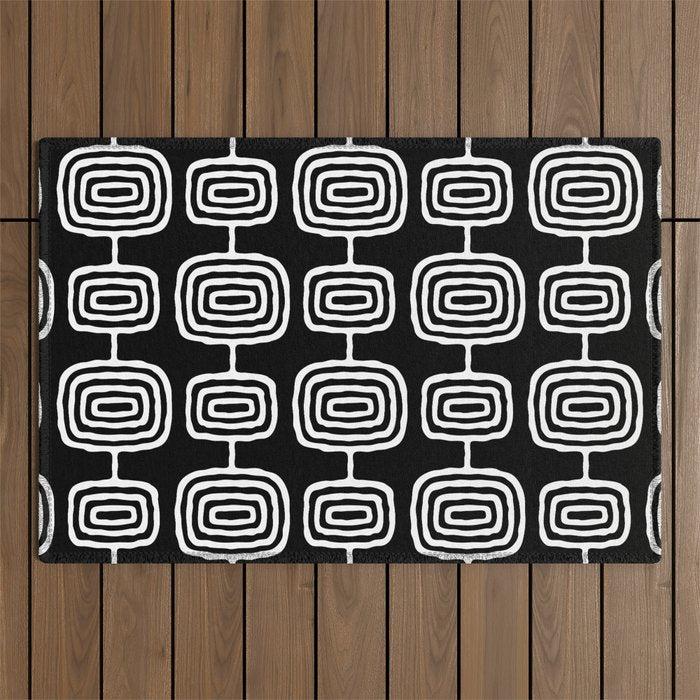 Mid Century Modern Atomic Rings Pattern Black and White Outdoor Rug Gallery Image 1