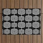Mid Century Modern Atomic Rings Pattern Black and White Outdoor Rug Gallery Image 1