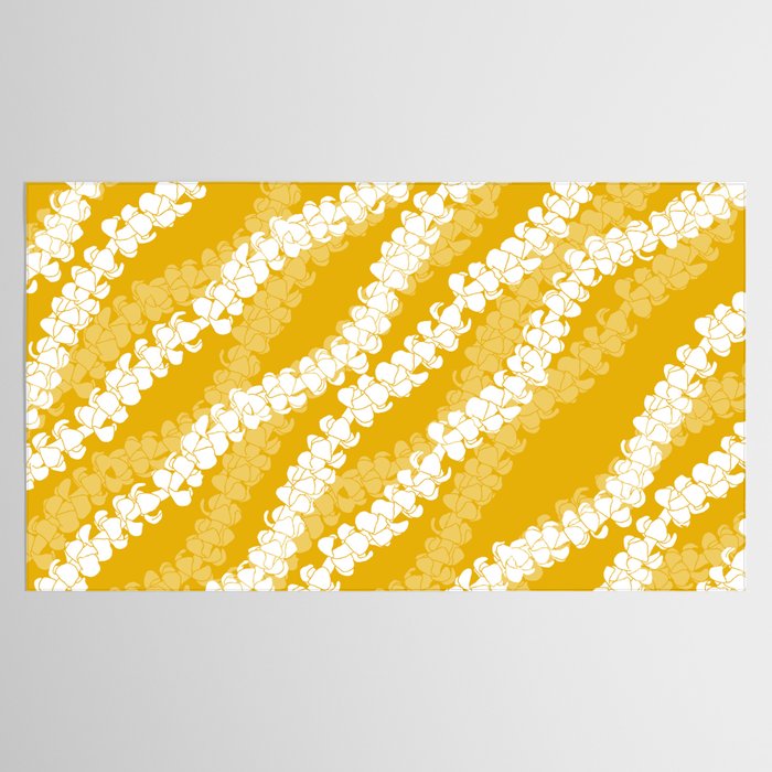 Puakenikeni single leis on Deep yellow Tablecloth Gallery Image 2