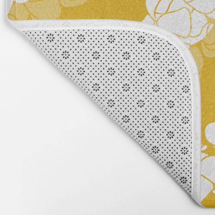 Puakenikeni single leis on Deep yellow Bath Mat Gallery Image 2