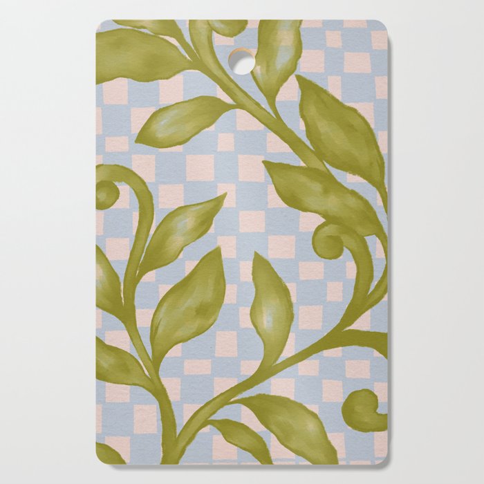 Vibrant Green Leaves on a Blue Checkered Background Cutting Board Gallery Image 1