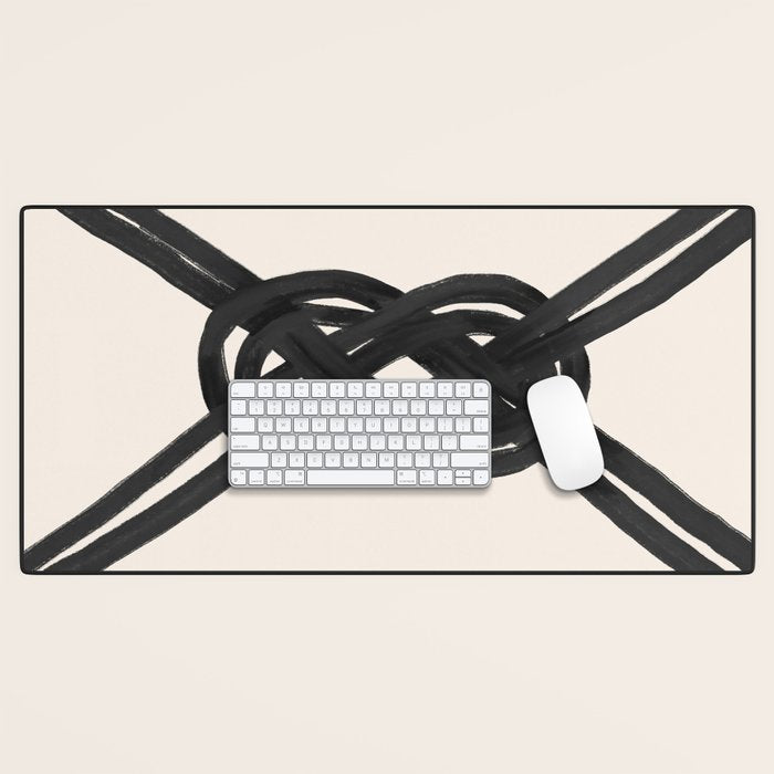 Minimalist Black Knot Abstract on Neutral Background Desk Mat Gallery Image 1