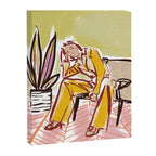 Woman sitting on sofa Canvas Print Gallery Image 6
