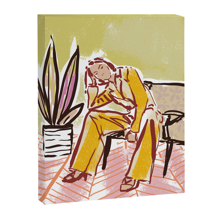 Woman sitting on sofa Canvas Print Gallery Image 1