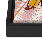 Woman sitting on sofa Framed Canvas Print Gallery Image 3