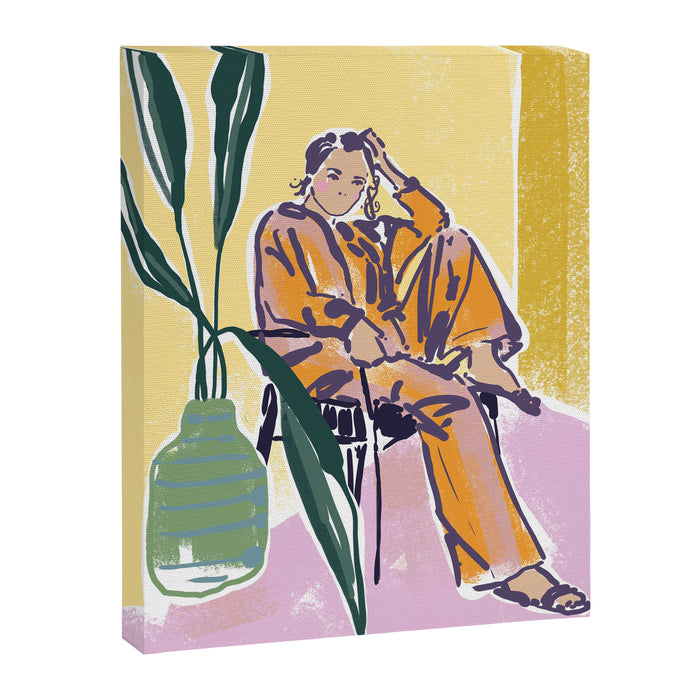 Woman wearing yellow pajamas Canvas Print Gallery Image 1