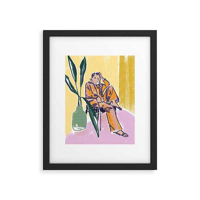 Woman wearing yellow pajamas Framed Art Print Gallery Image 1