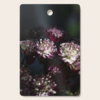 Full moon forest - still life dark astrantia major flowers - deep purple fall nature photography. Cutting Board Gallery Image 1