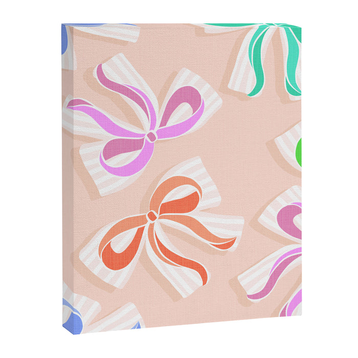 Ditsy Kitsch Ribbons and bows 1. Pastel Rainbow colours on Peach Canvas Print Gallery Image 1