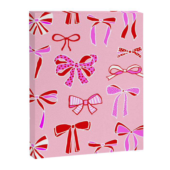 Festive Pink and Red Christmas Ribbons and Bows hand drawn Collection on Pastel Pink Canvas Print Gallery Image 1