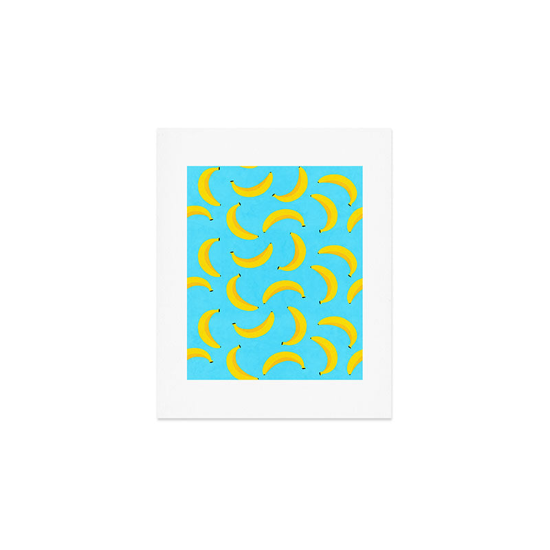 Minimal bold and vibrant banana pattern yellow on blue Art Print Gallery Image 1