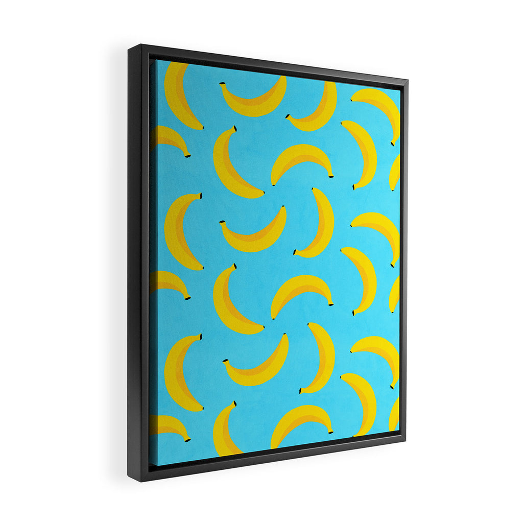 Minimal bold and vibrant banana pattern yellow on blue Framed Canvas Print Gallery Image 2