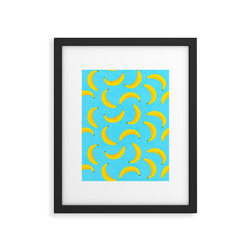 Minimal bold and vibrant banana pattern yellow on blue Framed Art Print Gallery Image 5