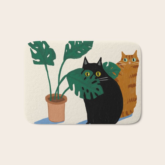 Black cat & orange tabby cat with Monstera plant Bath Mat Gallery Image 1