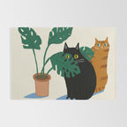 Black cat & orange tabby cat with Monstera plant Rug Gallery Image 2