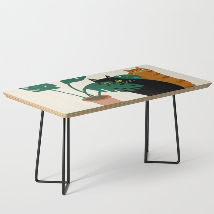 Black cat & orange tabby cat with Monstera plant Coffee Table Gallery Image 1