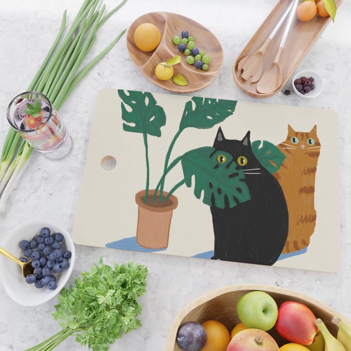 Black cat & orange tabby cat with Monstera plant Cutting Board Gallery Image 2