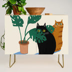 Black cat & orange tabby cat with Monstera plant Credenza Gallery Image 1