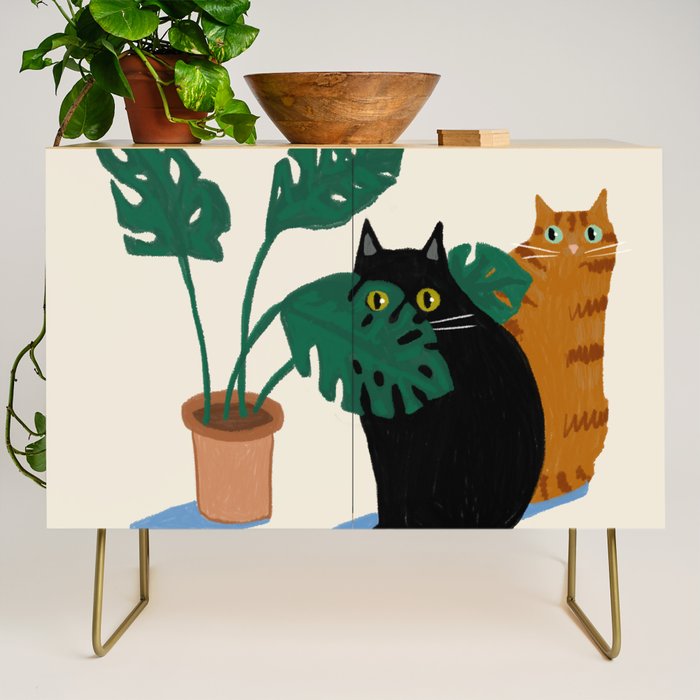 Black cat & orange tabby cat with Monstera plant Credenza Gallery Image 1