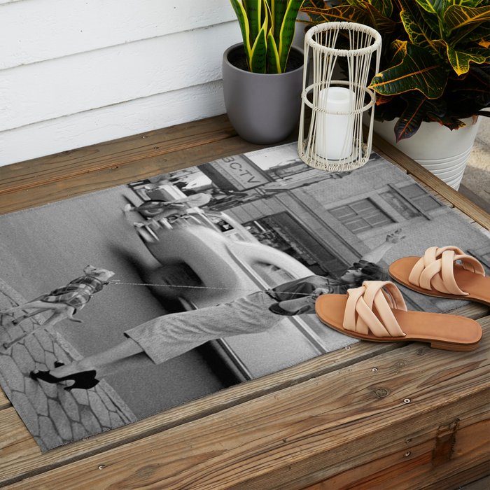 Young woman with pet dog hailing a yellow cab taxi New York City portrait black and white photograph - photography - photographs Outdoor Rug Gallery Image 2