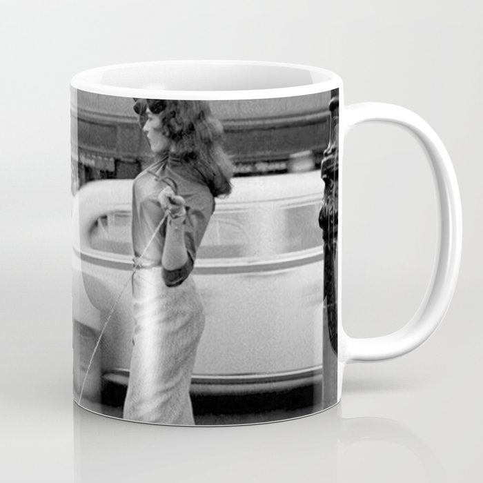 Young woman with pet dog hailing a yellow cab taxi New York City portrait black and white photograph - photography - photographs Coffee Mug Gallery Image 1