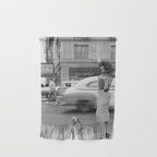 Young woman with pet dog hailing a yellow cab taxi New York City portrait black and white photograph - photography - photographs Wall Hanging Gallery Image 1