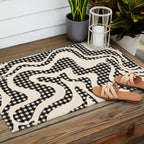 Retro Liquid Swirl Abstract Gingham Check Pattern in Black and Almond Cream Outdoor Rug Gallery Image 2