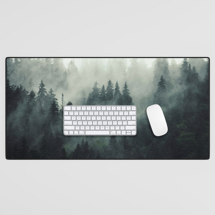 Green misty mountain pine forest in cloudy and rainy - vintage style photo Desk Mat Gallery Image 1