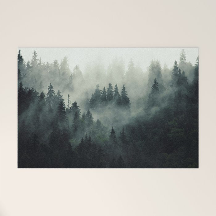 Green misty mountain pine forest in cloudy and rainy - vintage style photo Welcome Mat Gallery Image 1