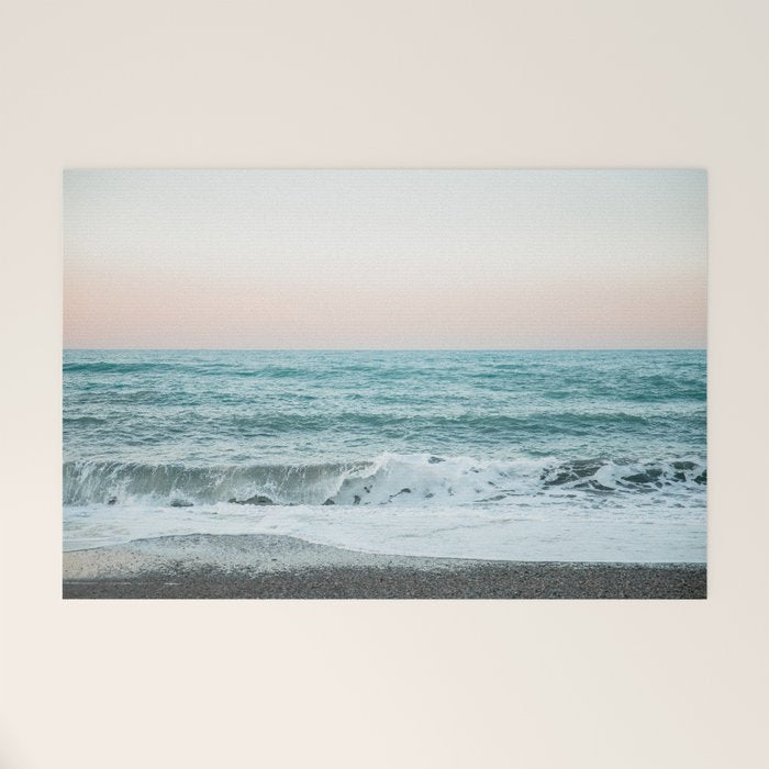 Sunset by the sea - Blue ocean, pink sky Welcome Mat Gallery Image 1
