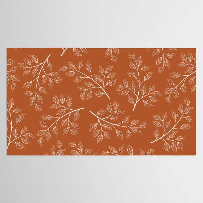Delicate White Leaves and Branch on a Rust Orange Background Tablecloth Gallery Image 2