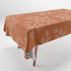 Delicate White Leaves and Branch on a Rust Orange Background Tablecloth Gallery Image 1