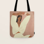  portrait of a fragile woman in a white suit on a pink background Tote Bag Gallery Image 1
