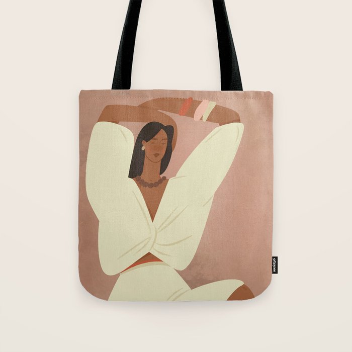  portrait of a fragile woman in a white suit on a pink background Tote Bag Gallery Image 1