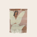 portrait of a fragile woman in a white suit on a pink background Wall Hanging Gallery Image 1