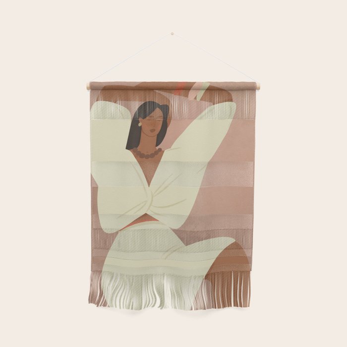  portrait of a fragile woman in a white suit on a pink background Wall Hanging Gallery Image 1