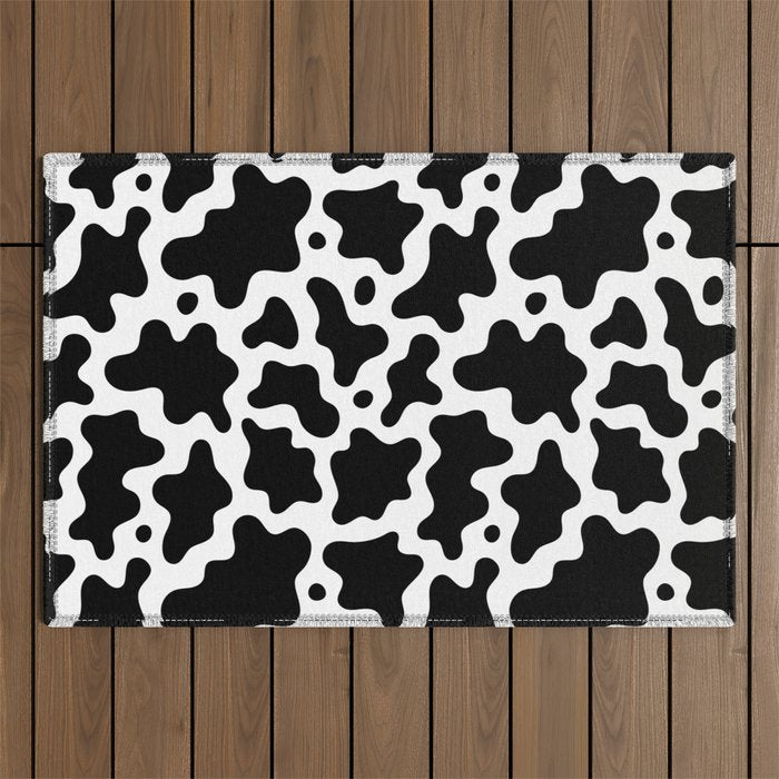 Abstract black and white cow print pattern Outdoor Rug Gallery Image 1