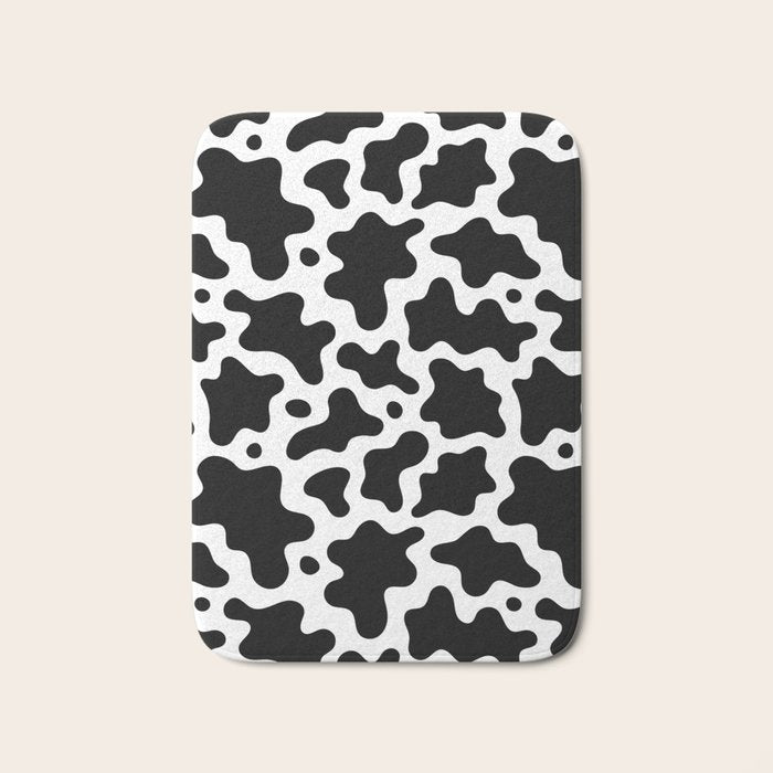 Abstract black and white cow print pattern Bath Mat Gallery Image 1