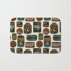 Vagabondâs Cupboard - black and cream with red, gold, teal, and peach Bath Mat Gallery Image 1