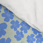 Blue flower blossom scatter on soft green Comforter Gallery Image 4