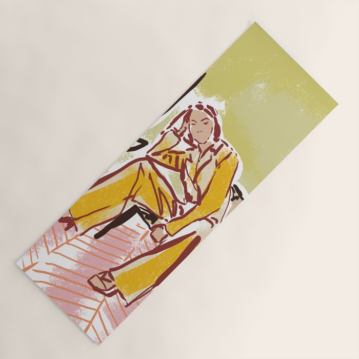 Woman sitting on sofa Yoga Mat Gallery Image 1