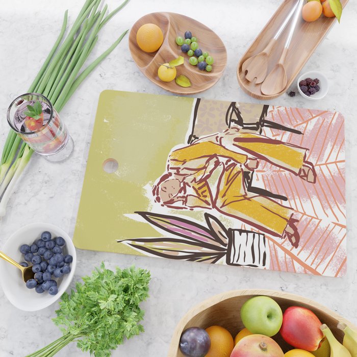 Woman sitting on sofa Cutting Board Gallery Image 2