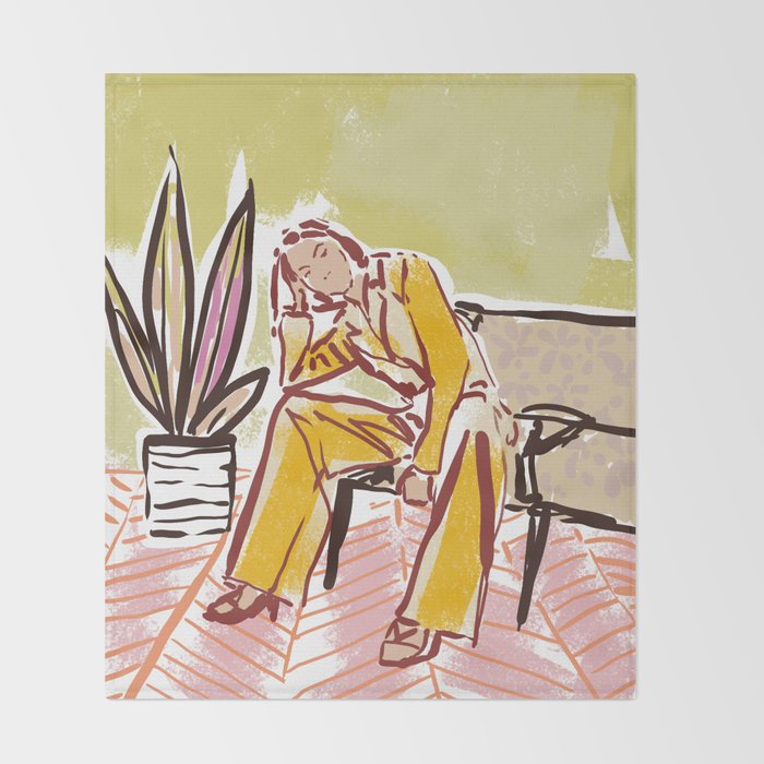 Woman sitting on sofa Throw Blanket Gallery Image 2