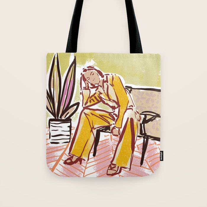 Woman sitting on sofa Tote Bag Gallery Image 1