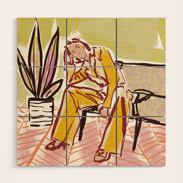 Woman sitting on sofa Wood Wall Art Gallery Image 1
