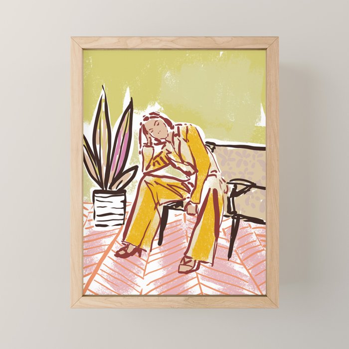 Woman sitting on sofa Mini Art Print Gallery Image 1